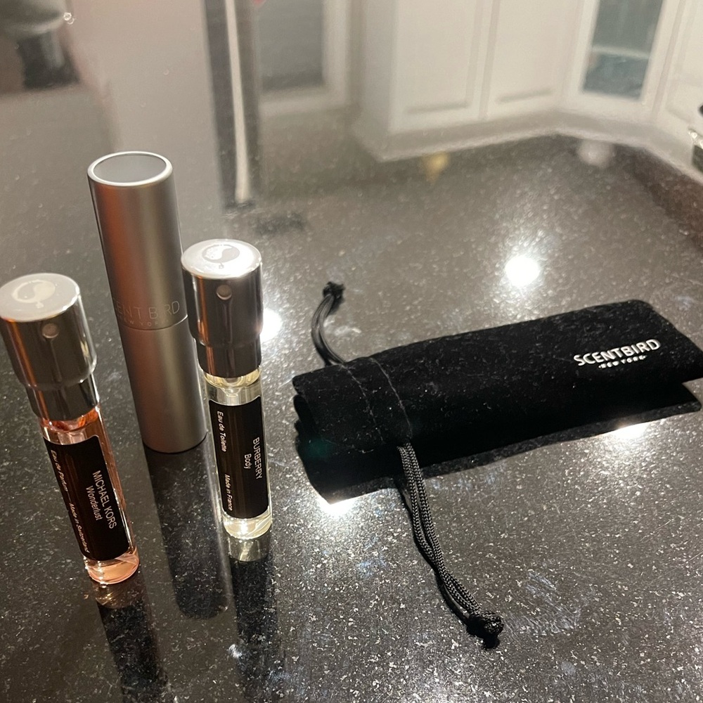 Scent bird 2 perfumes, atomizer, & pouch. Can sell them individually. $10 each